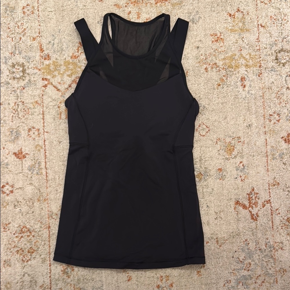 Lululemon black workout top with mesh size 4